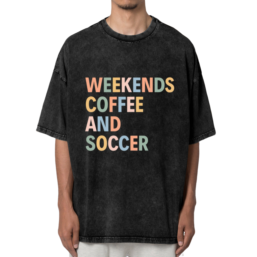 Unisex washed graphic T-shirt with Weekends Coffee And Soccer themed design, product image