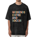 Unisex washed graphic T-shirt with Weekends Coffee And Soccer themed design, product image