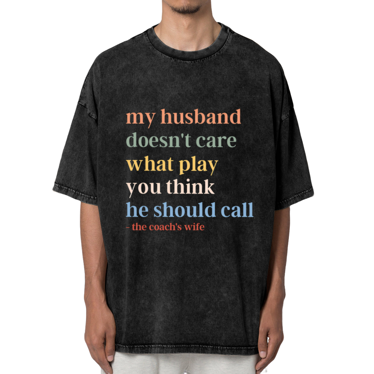 Unisex washed graphic T-shirt with My Husband Doesn't Care What Play You Think He Should Call The Coaches Wife themed design, product image