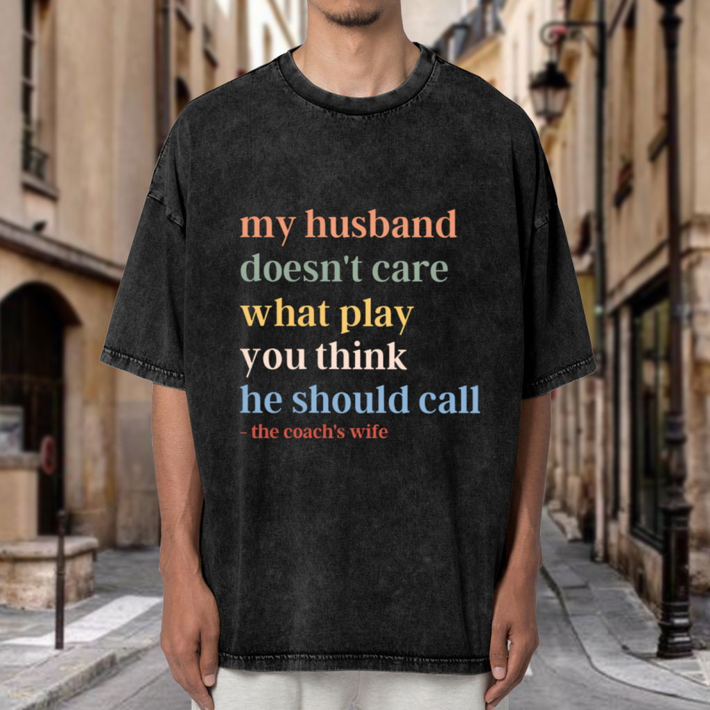 Unisex washed graphic T-shirt with My Husband Doesn't Care What Play You Think He Should Call The Coaches Wife themed design, product image