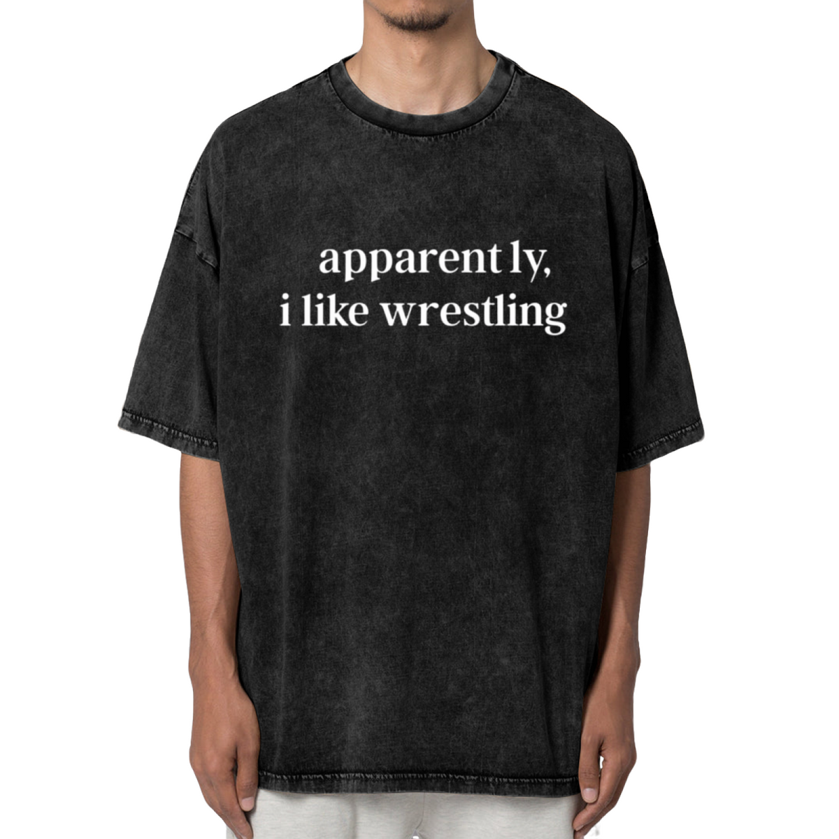 Unisex washed graphic T-shirt with Apparently I Like Wrestling themed design, product image