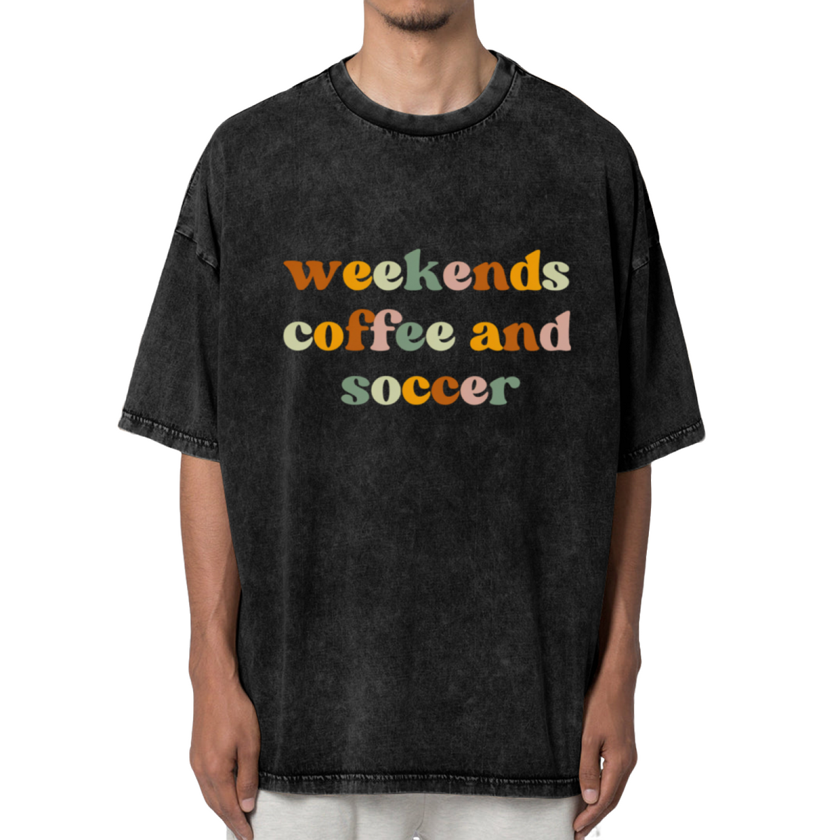 Unisex washed graphic T-shirt with Weekends Coffee And Soccer themed design, product image