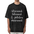 Unisex washed graphic T-shirt with Stressed Blessed And Pilates Obsessed themed design, product image