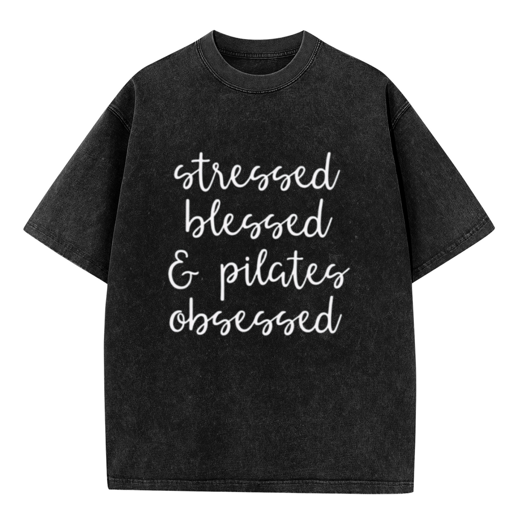 Unisex washed graphic T-shirt with Stressed Blessed And Pilates Obsessed themed design, product image