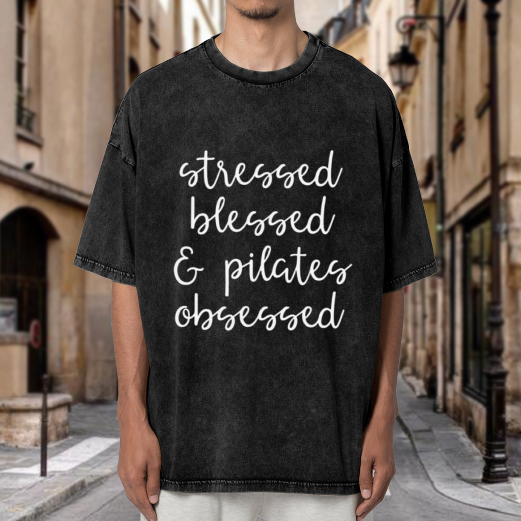 Unisex washed graphic T-shirt with Stressed Blessed And Pilates Obsessed themed design, product image