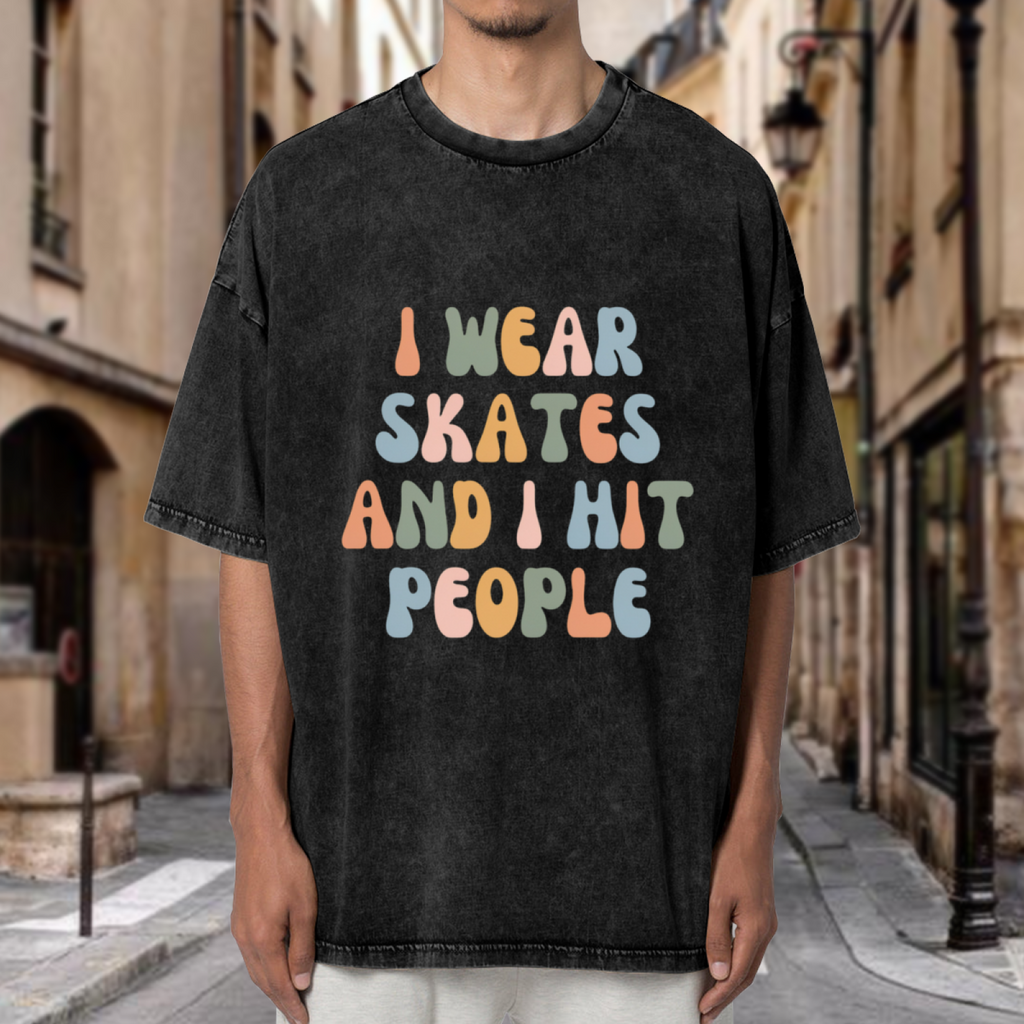 Unisex washed graphic T-shirt with I Wear Skates And I Hit People themed design, product image