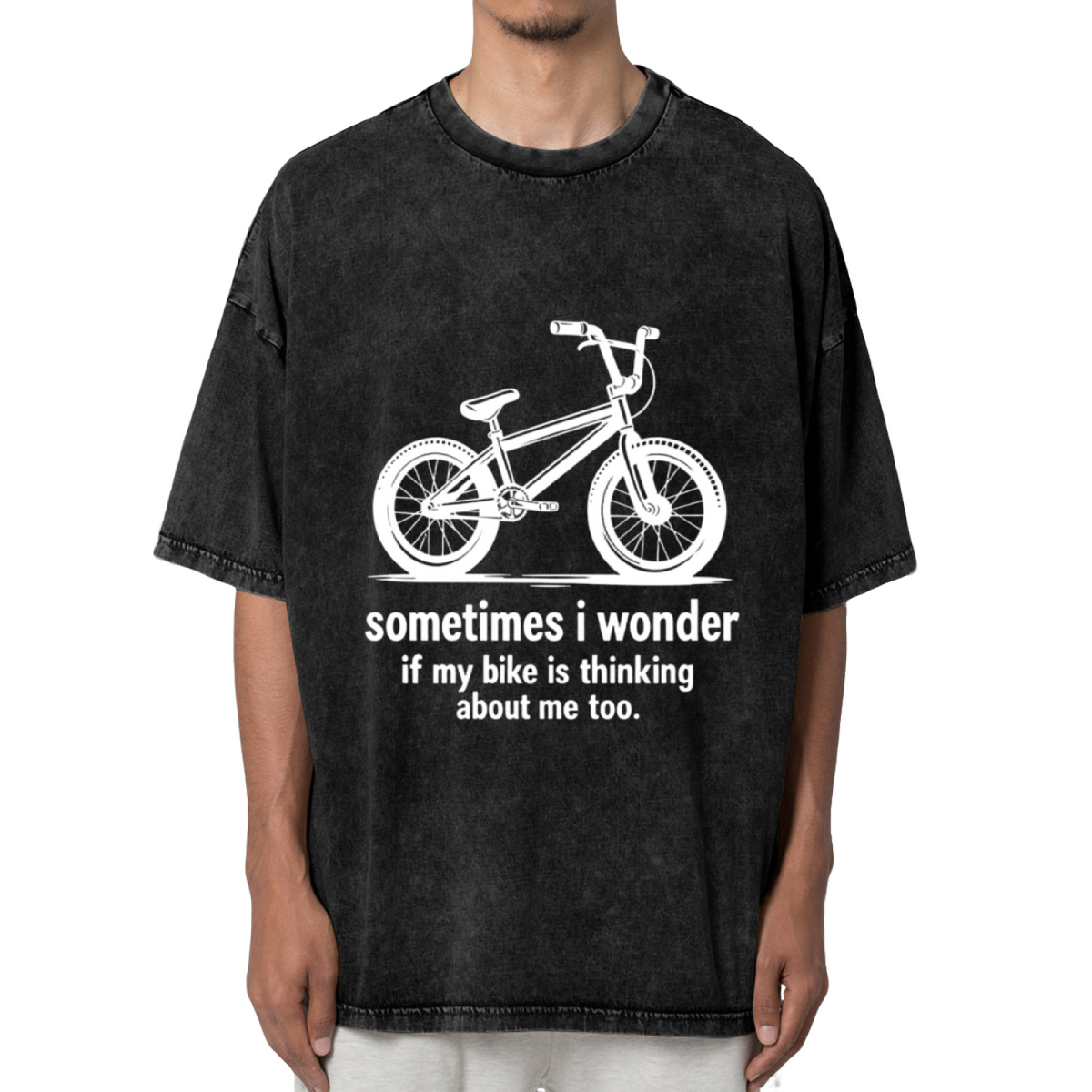 Unisex washed graphic T-shirt with Sometimes I Wonder If My Bike Is Thinking About Me Too Bike themed design, product image