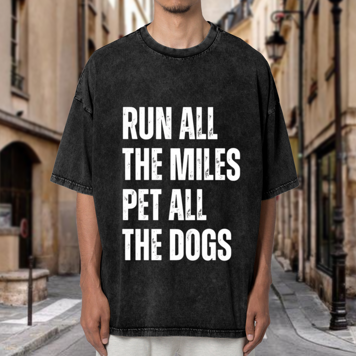 Unisex washed graphic T-shirt with Run All The Miles Pet All The Dogs themed design, product image