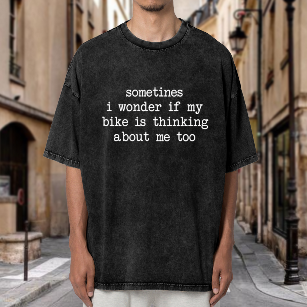 Unisex washed graphic T-shirt with Sometimes I Wonder If My Bike Is Thinking About Me Too Bike themed design, product image