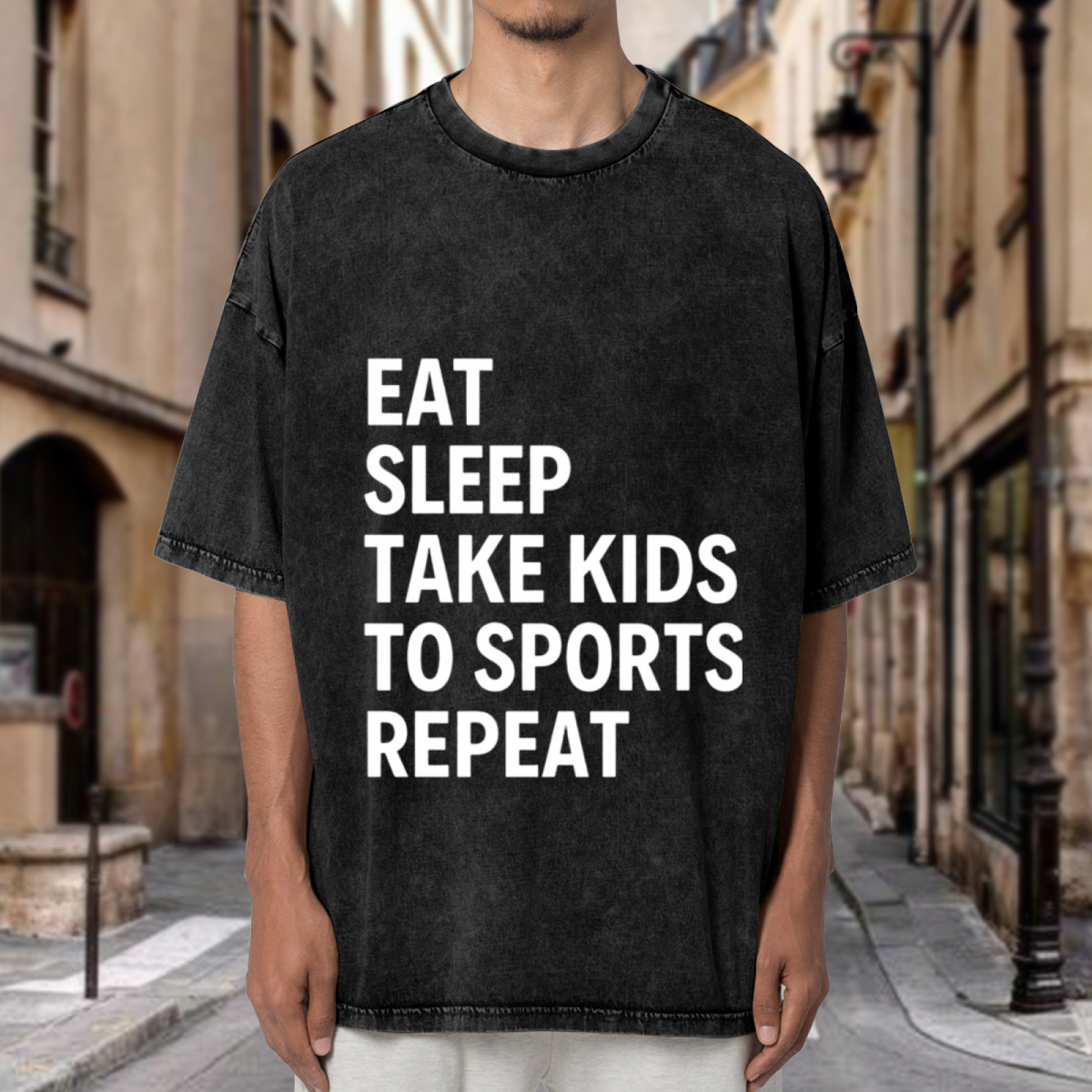 Unisex washed graphic T-shirt with Eat Sleep Take Kids To Sports Repeat themed design, product image