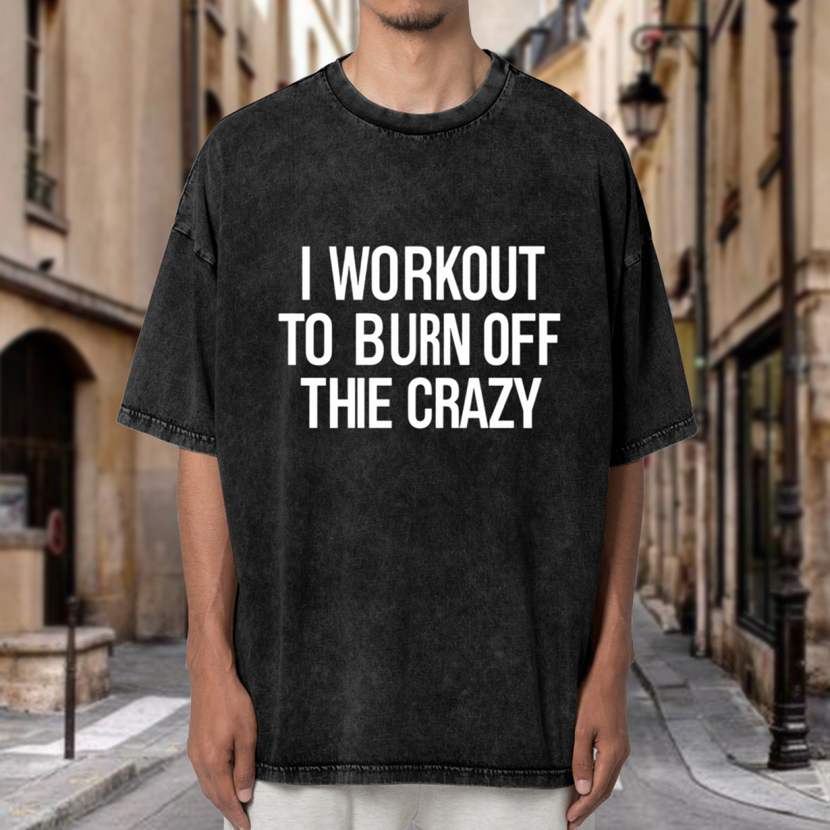 Unisex washed graphic T-shirt with I Workout To Burn Off The Crazy themed design, product image