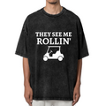 Unisex washed graphic T-shirt with They See Me Rollin themed design, product image