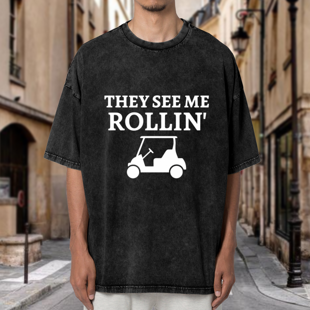 Unisex washed graphic T-shirt with They See Me Rollin themed design, product image