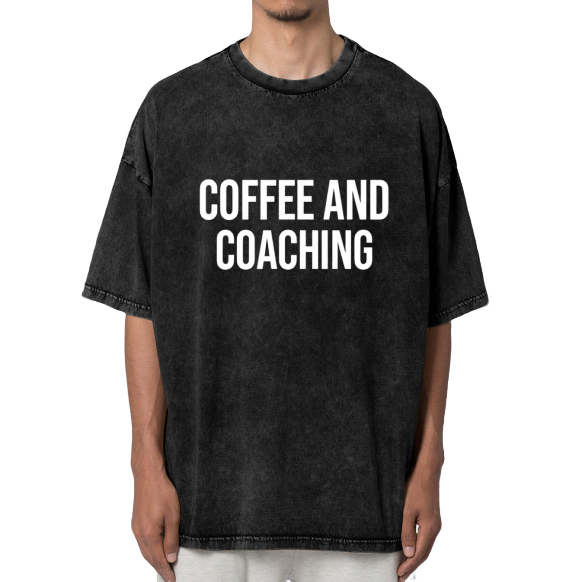 Unisex washed graphic T-shirt with Coffee And Coaching themed design, product image