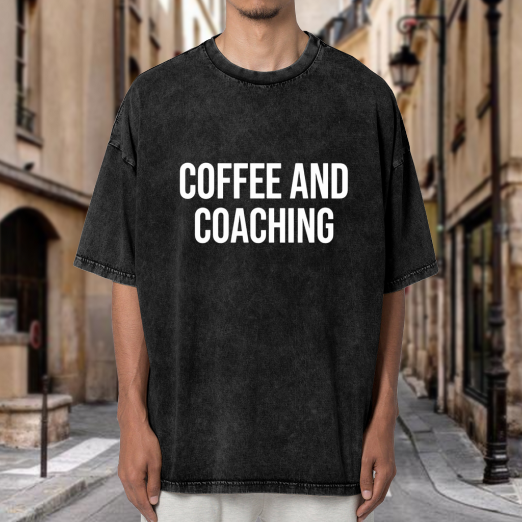Unisex washed graphic T-shirt with Coffee And Coaching themed design, product image