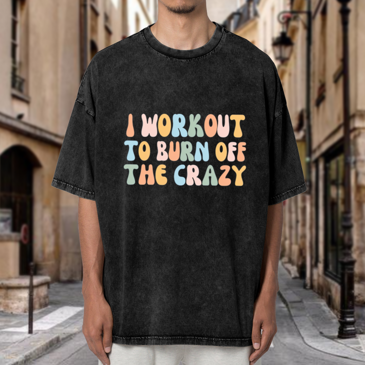 Unisex washed graphic T-shirt with I Workout To Burn Off The Crazy themed design, product image