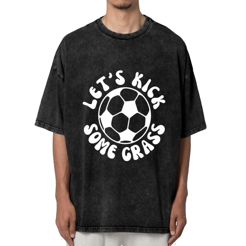 Unisex washed graphic T-shirt with Let's Kick Some Grass themed design, product image