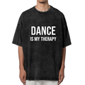 Product image of washed graphic T-shirt featuring 'Dance Is My Therapy' statement design
